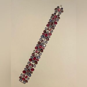 Swarovski Crystal pink and purple 8” bracelet with 1” removable extension piece.